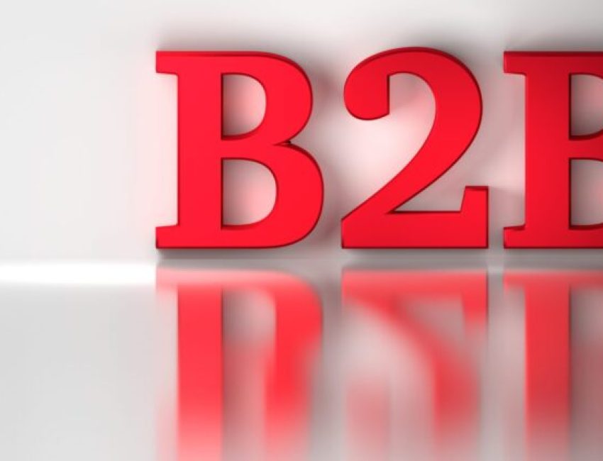 B2B business to business text red letters on shiny reflective white surface. 3d illustration.
